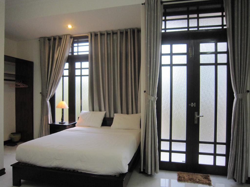 Seastar Homestay Hoi An Habitación foto